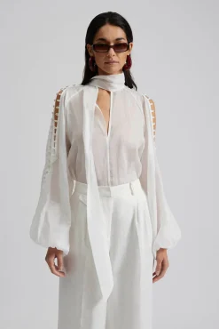 Malina Cora blus